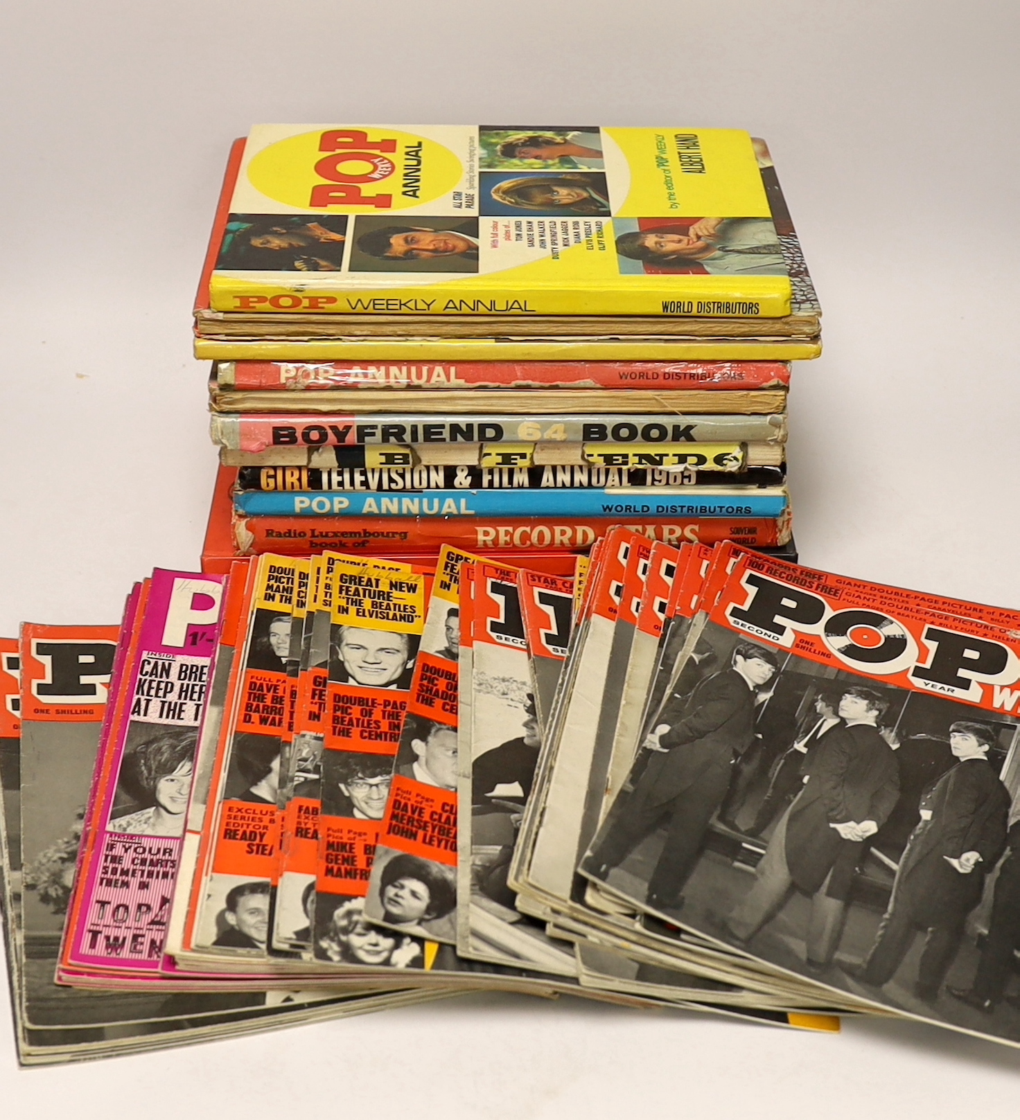 Twelve 1960's pop music annuals including, Pop Weekly Annual, Top Pop Stars, Boyfriend, Record Stars, et cetera. Together with a small quantity of pop weekly publications